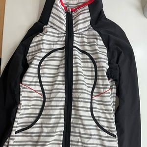 Black,white,grey, and red Lululemon zip up jacket